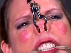 Facial torture for BDSM model